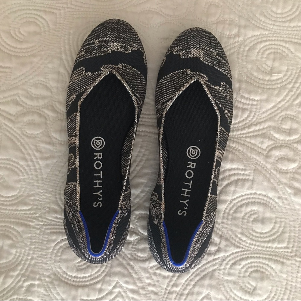 Rothy’s black and gold flats